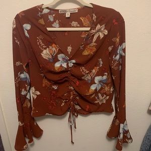 Flowy orange floral blouse